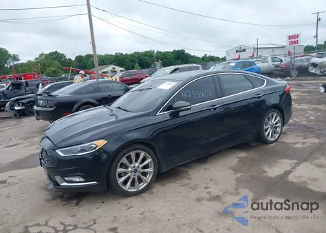 2017 Ford Fusion Platinum z USA, uszkodzony, nr VIN 3FA6P0K98HR103704
